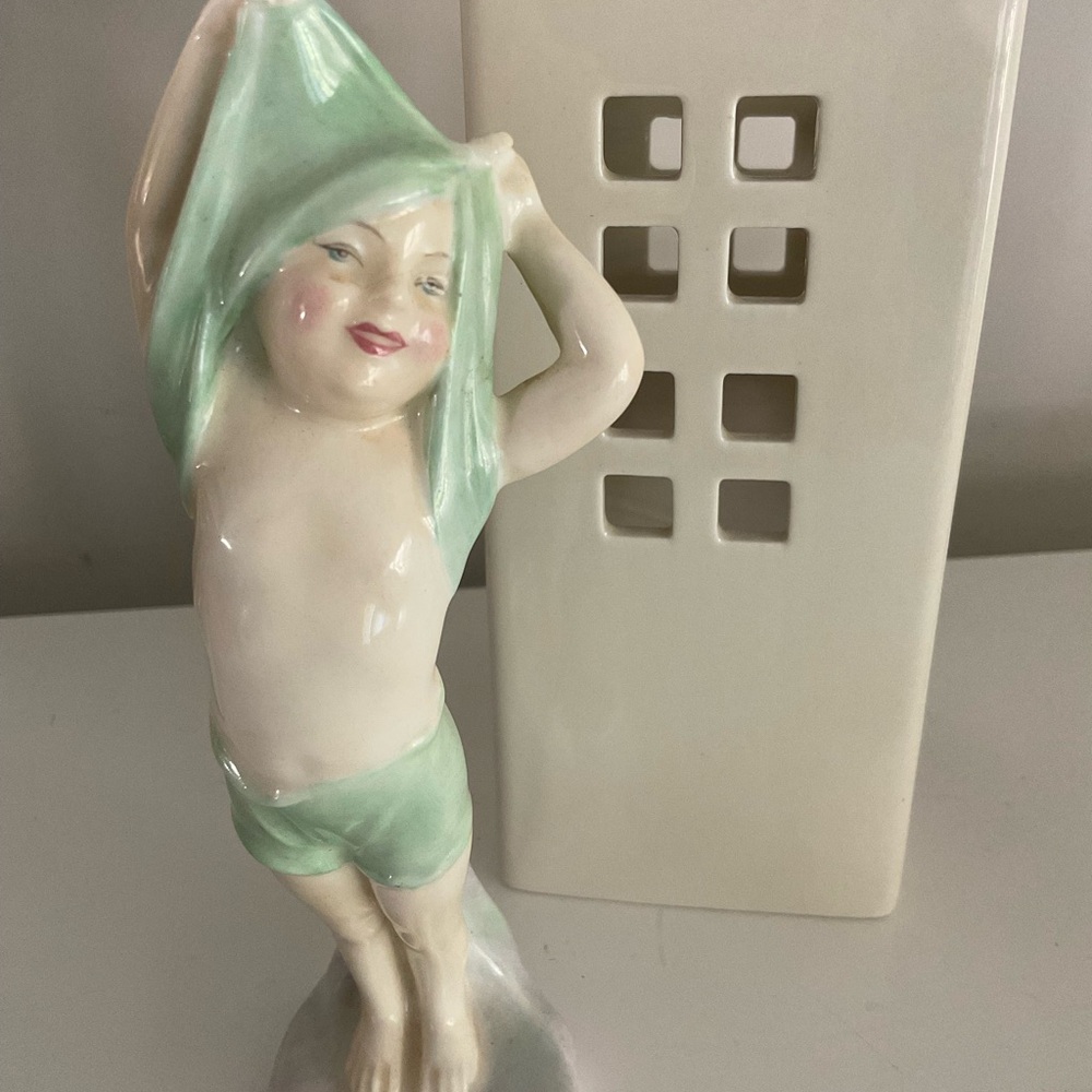 Royal Doulton “to bed”…bone china figure, early 1900s, mint